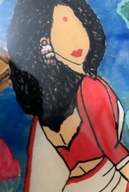 Close-up painting of a woman with flowing hair in a red and white saree